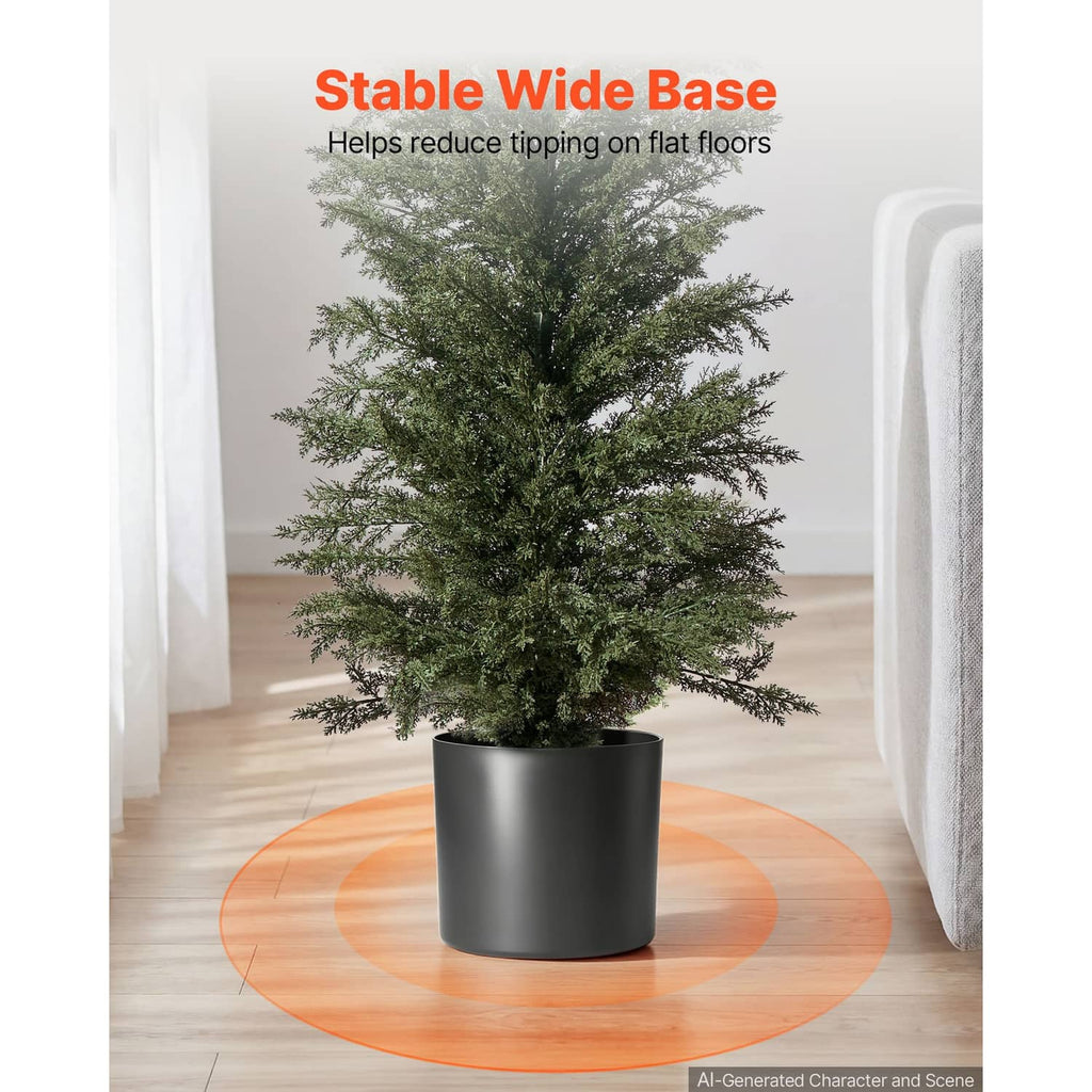 Artificial cedar topiary tree with wide round base in a dark pot