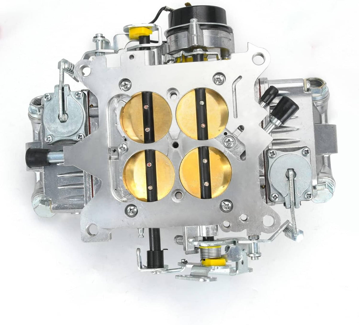 Four-barrel carburetor front plate showing four throttle bores and linkage housing