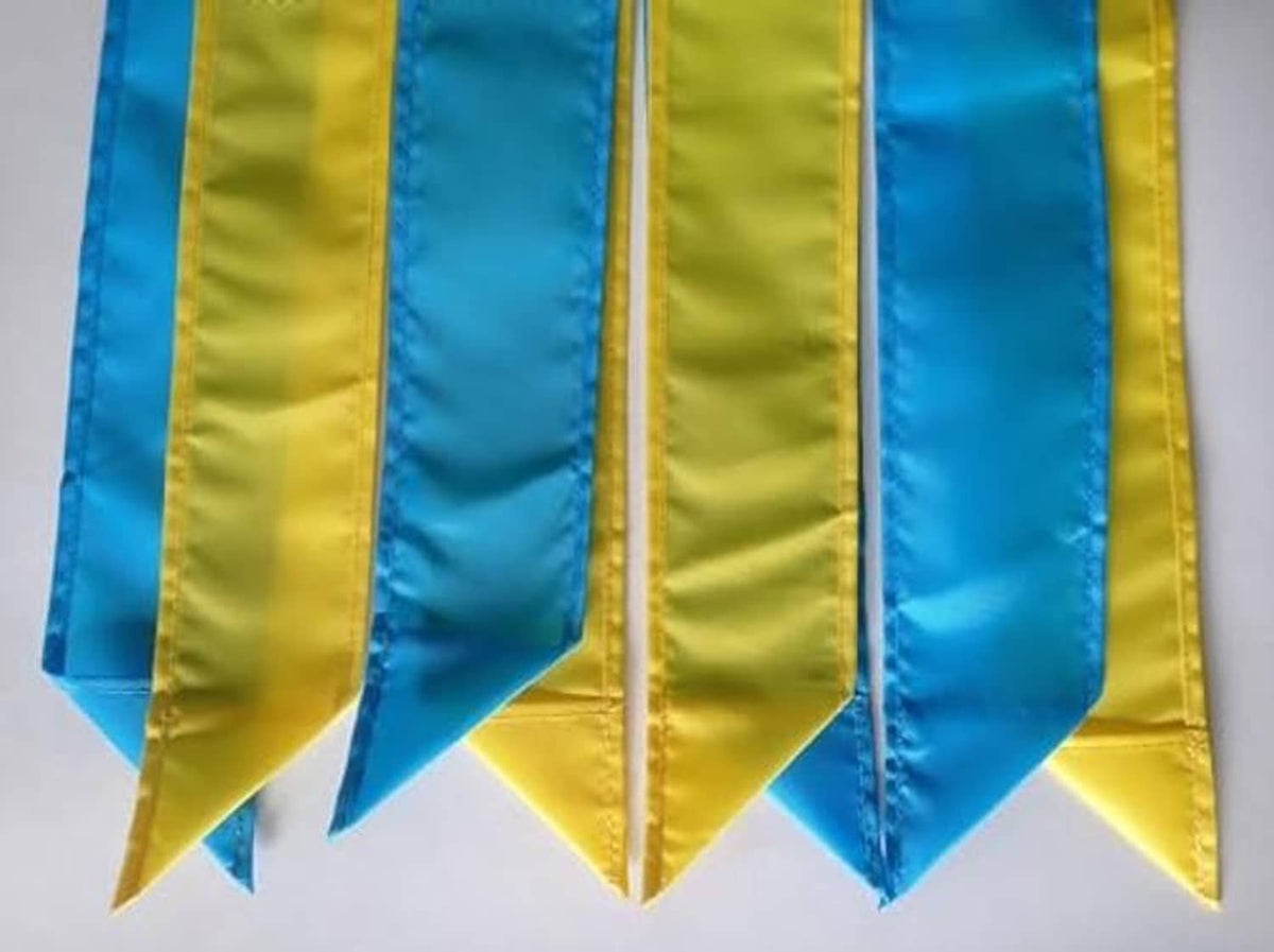 Blue and yellow striped windsock streamers with stitched hanging sections