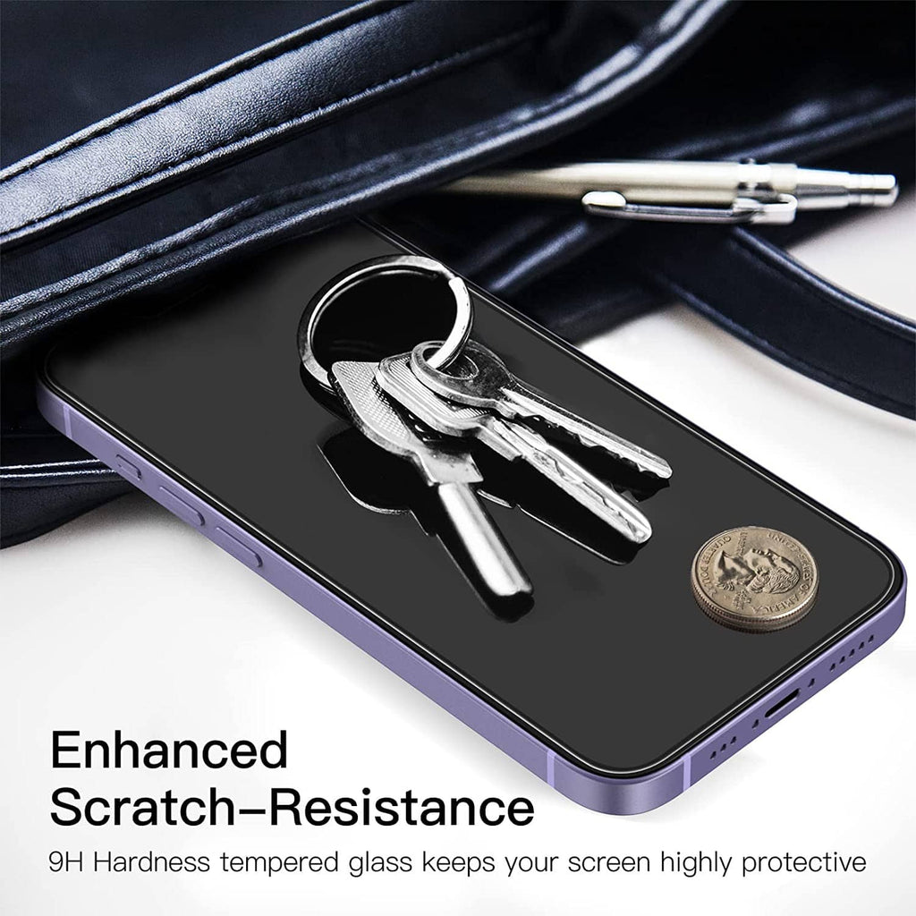 Tempered glass screen protector on a dark iPhone with keys and coin on top