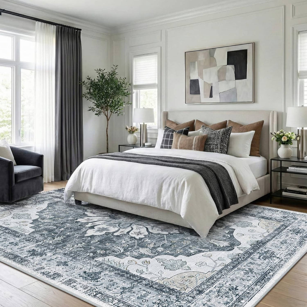 Grey, white, and beige rectangular area rug with ornate medallion pattern