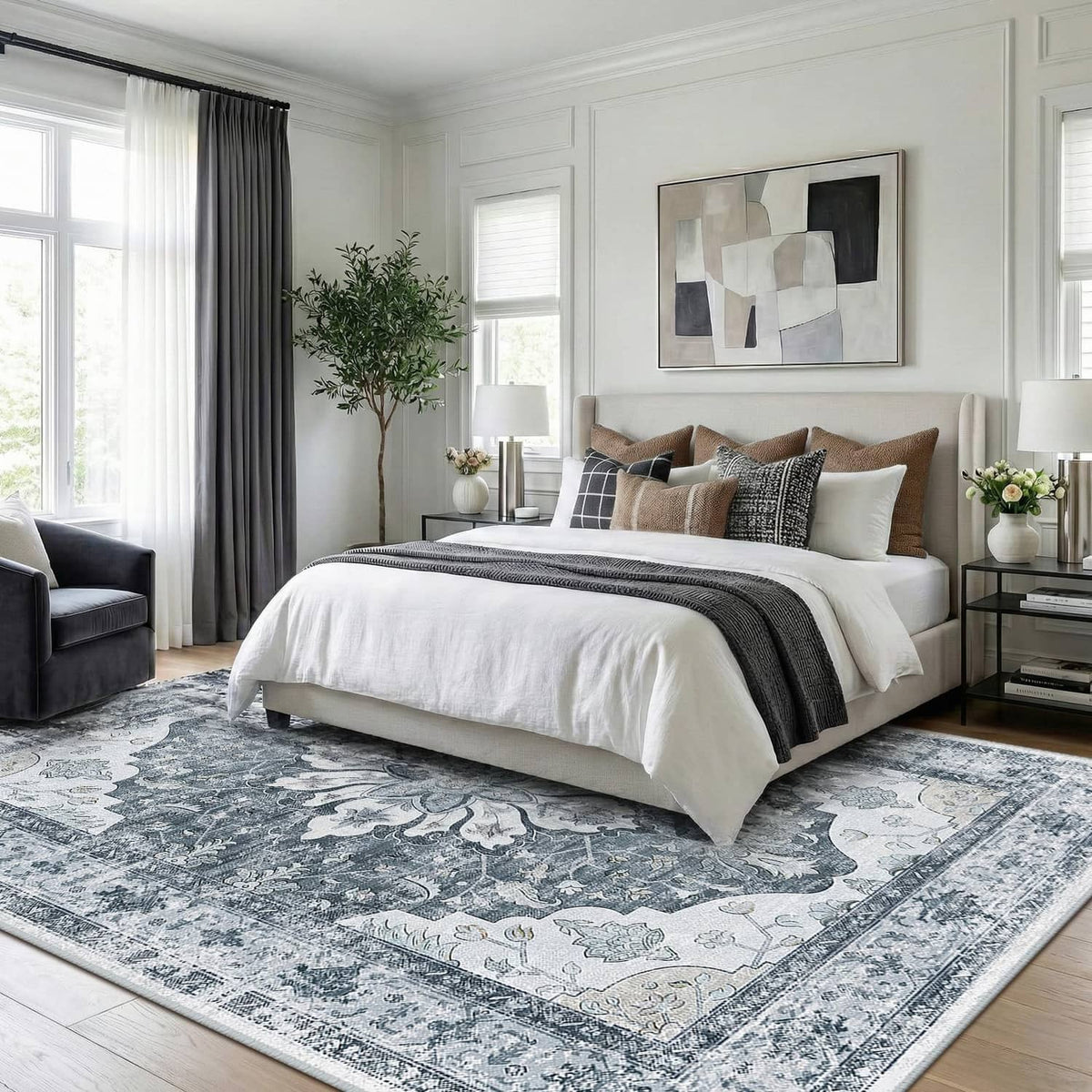 Grey, white, and beige rectangular area rug with ornate medallion pattern