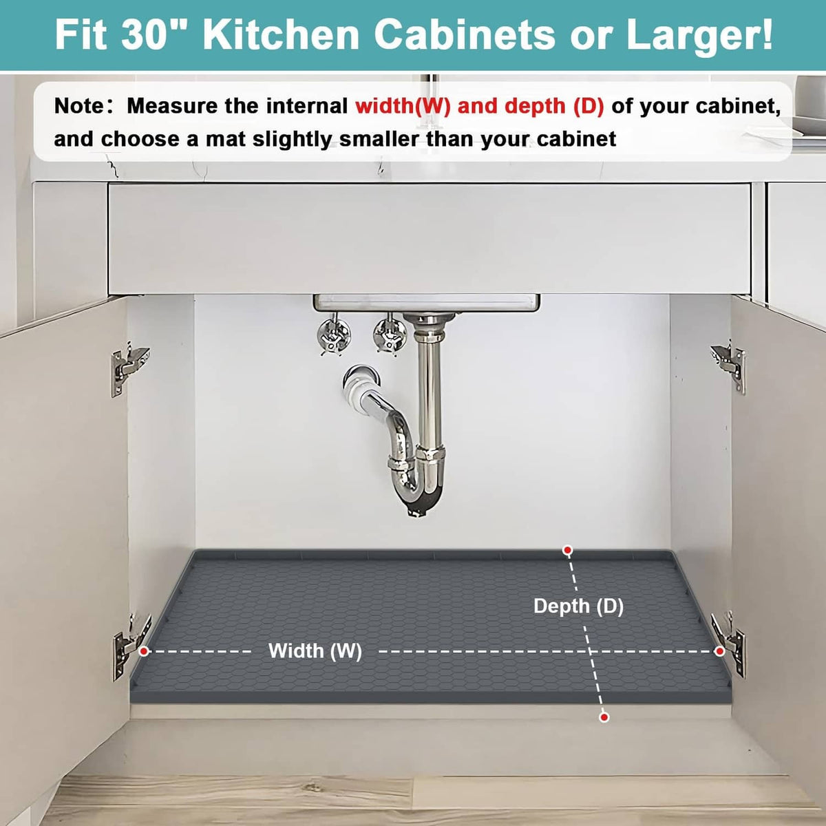 Gray silicone under-sink mat placed in cabinet base, showing raised border