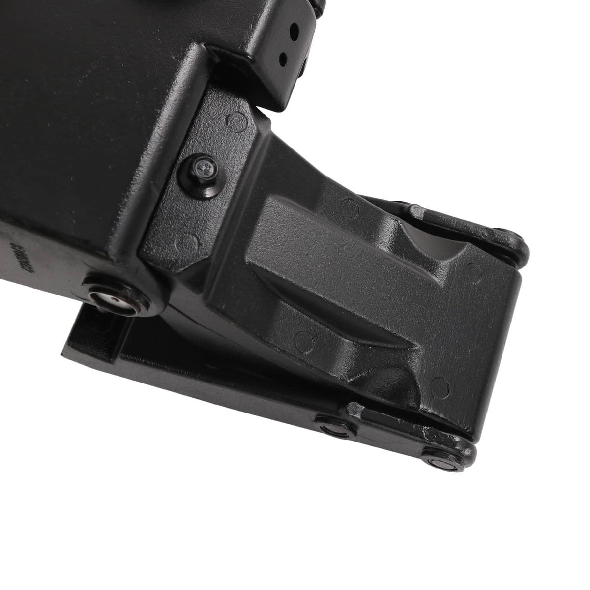 Power running board actuator bracket, close-up black housing with mounting holes and screws