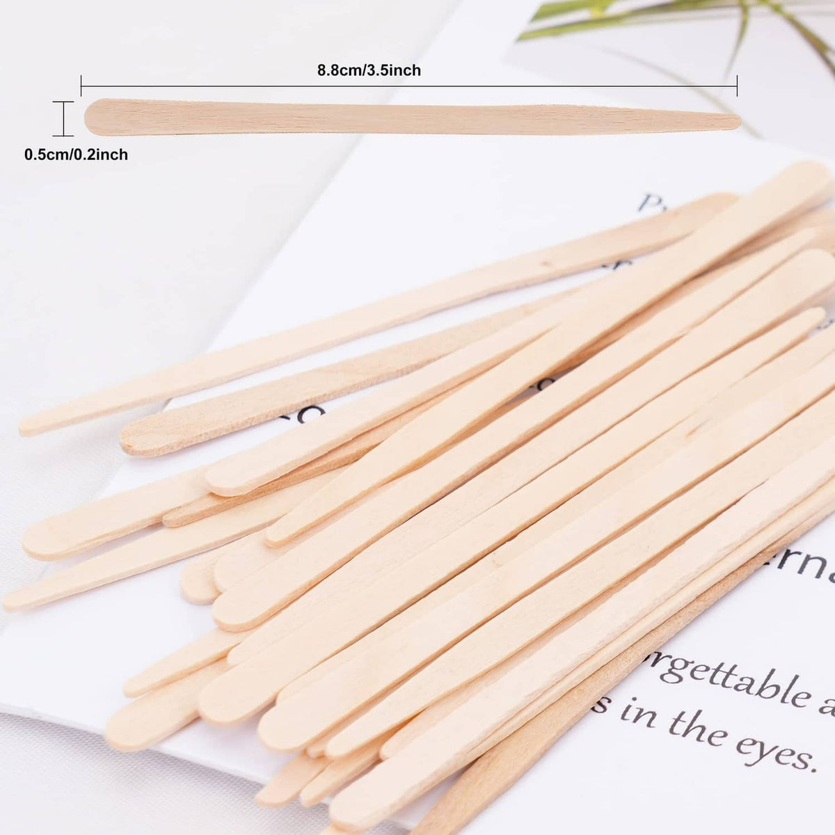 Eyebrow wax applicator sticks with size-marked slender wooden spatulas