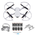 Drone with propeller guards, two-tone blades, landing skids, and accessory set