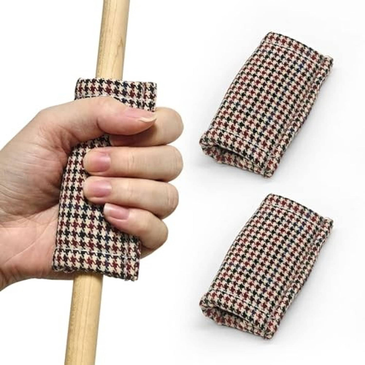 Two folded houndstooth cleaning cloth squares for cue shaft wiping