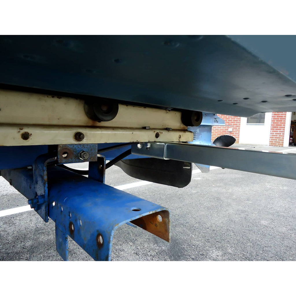 Underside view of mounted boat trailer bunk board guide bracket and support bar