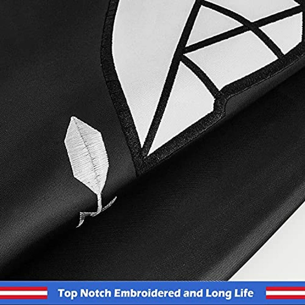 Embroidered POW-MIA flag corner detail with black trim and visible stitched seam