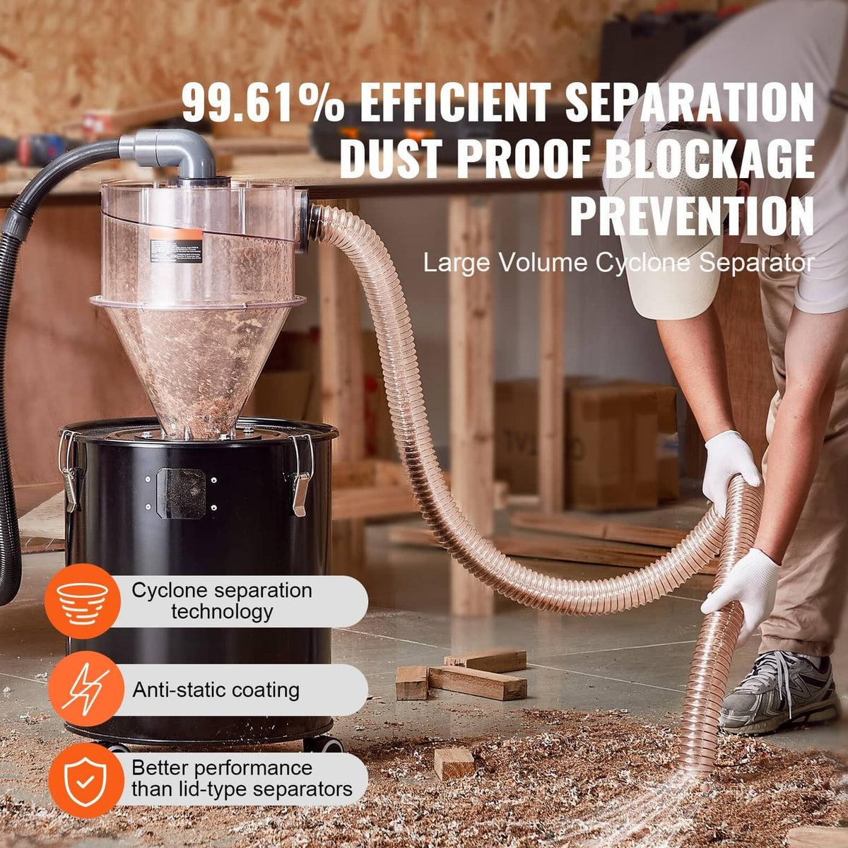 Cyclone dust separator with connected vacuum hoses and dust-filled collection funnel in workshop
