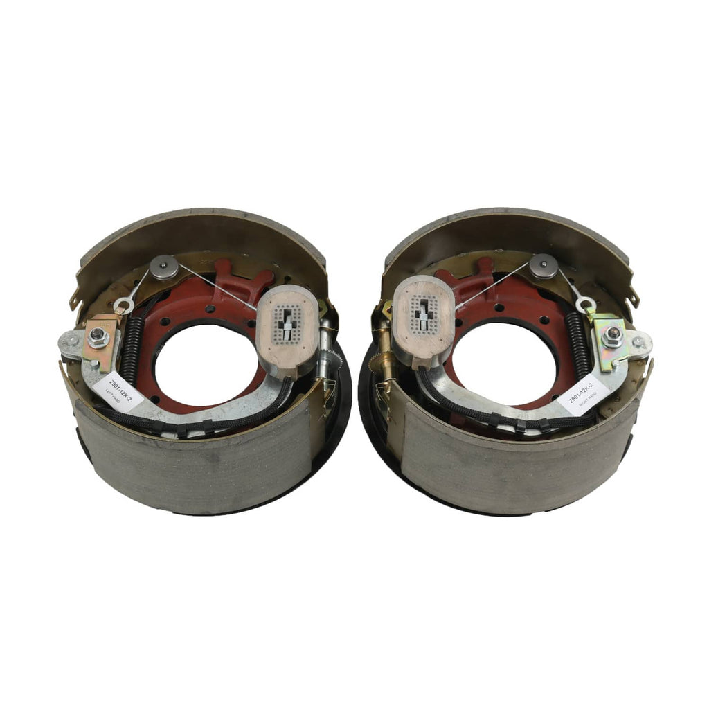 Electric trailer brake backing plate assemblies, two brake housings with red backing plates