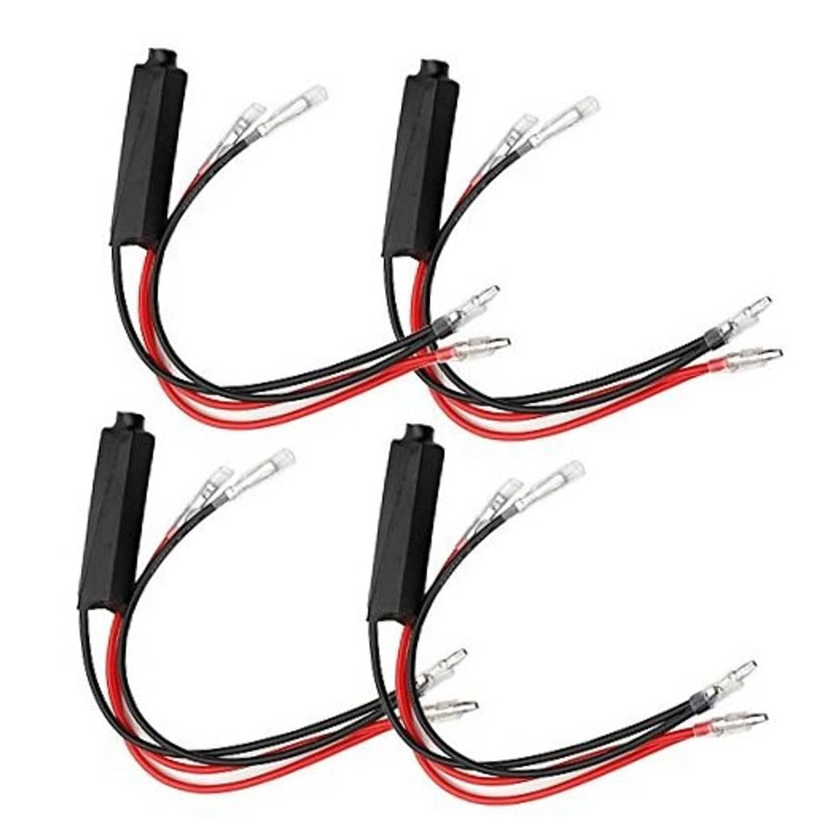 Four motorcycle LED turn-signal load resistors with black housings, red/black wires, clear plugs