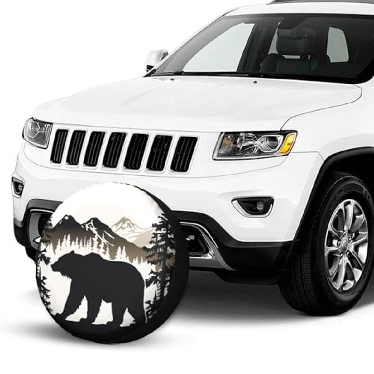 Bear mountain spare tire cover on a white SUV near the front wheel area