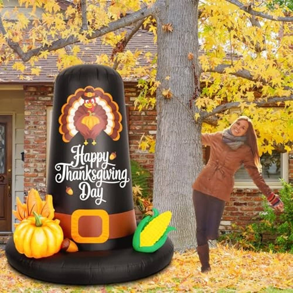 Inflatable black pilgrim hat decoration with turkey graphic, pumpkin and corn; LED-style glow