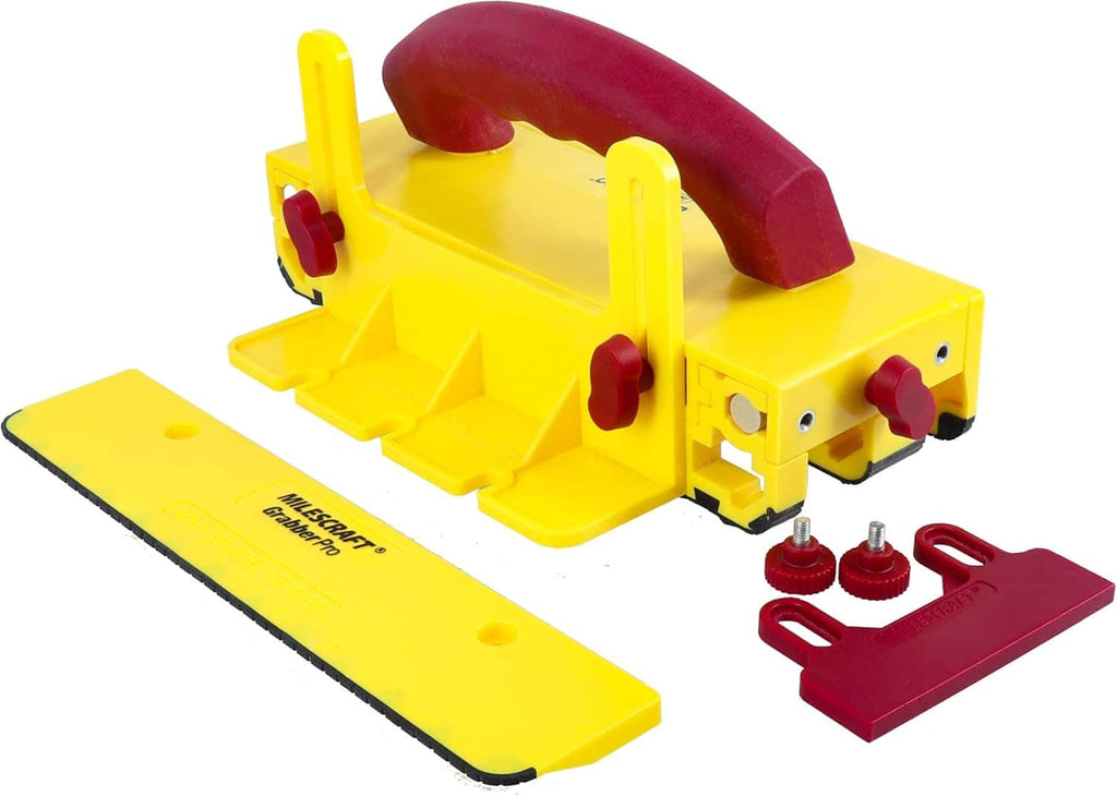 Yellow push block kit with burgundy handle, two pads, and red mounting piece
