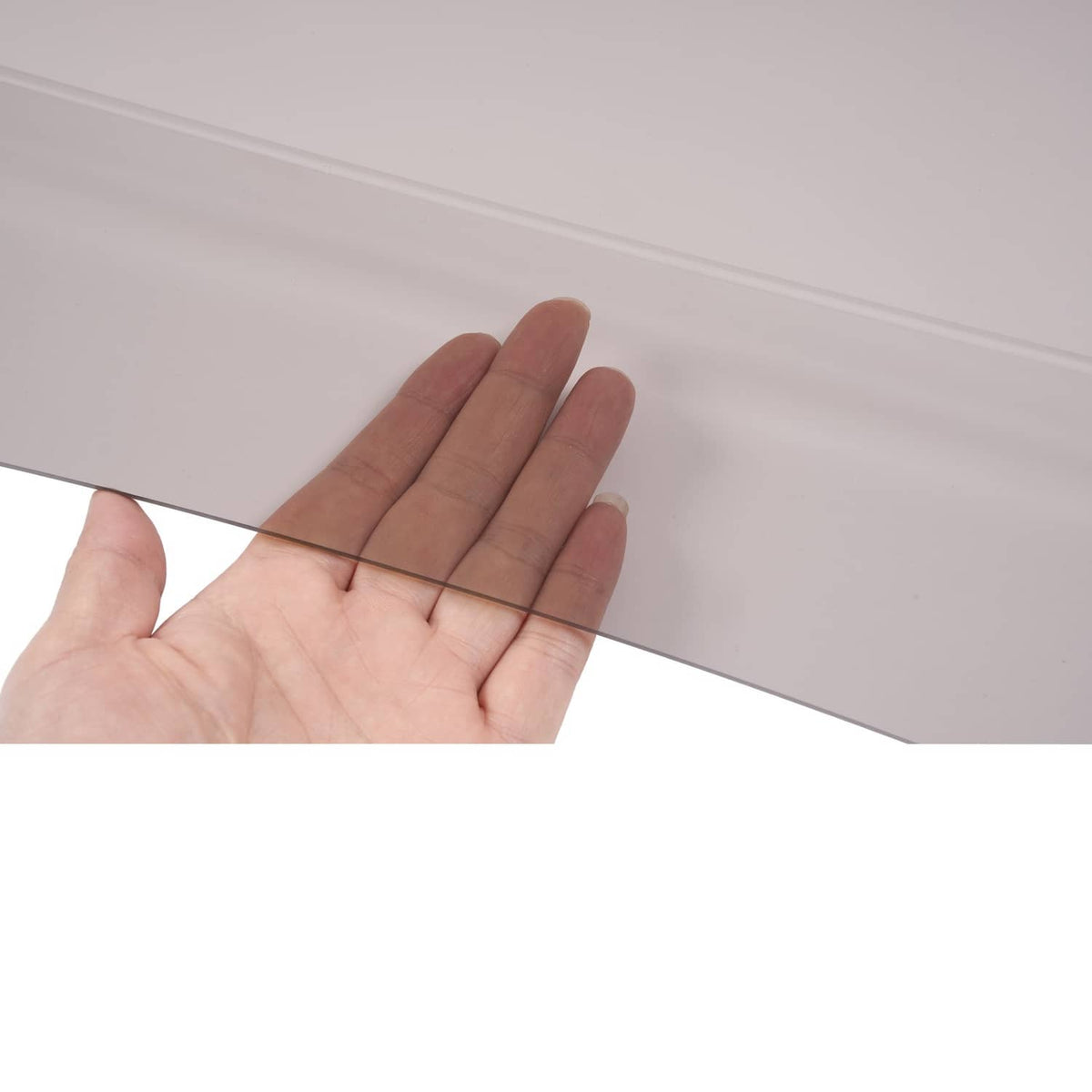 Hand testing tinted clear smoke windshield panel thickness and flexibility