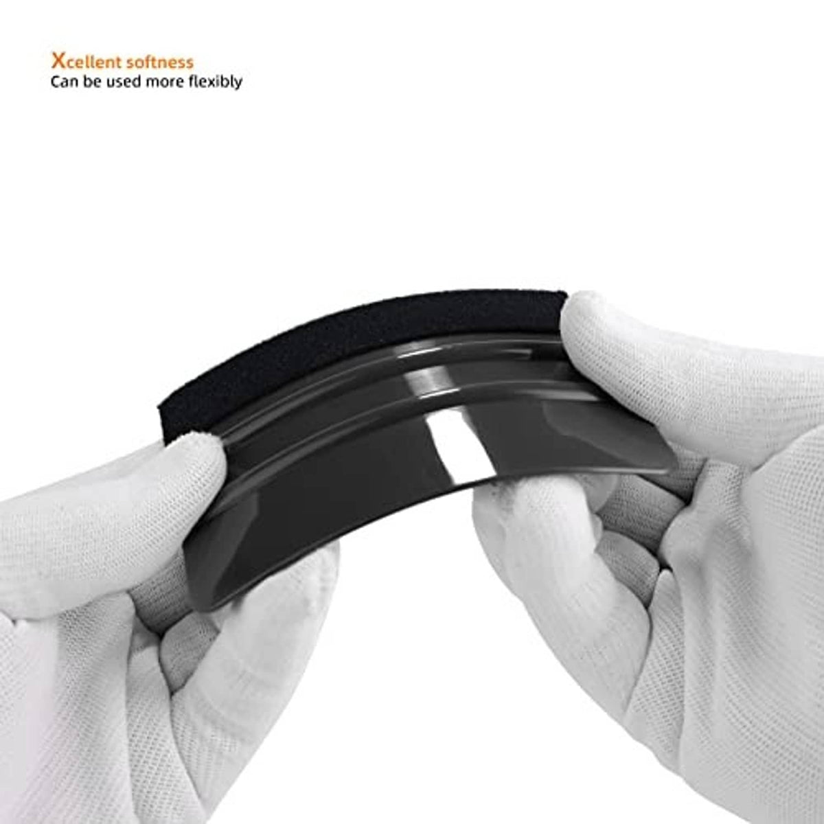 Black vinyl squeegee with curved blade and felt edge, shown flexing for smoothing