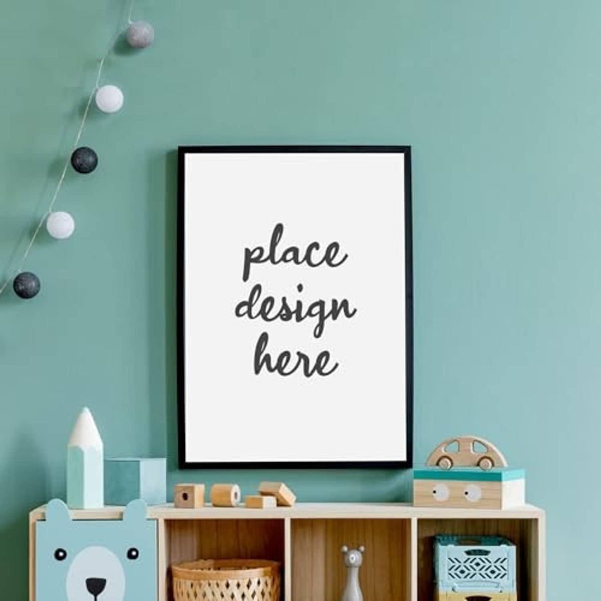 Black wooden picture frame with handwritten-style text 'place design here'