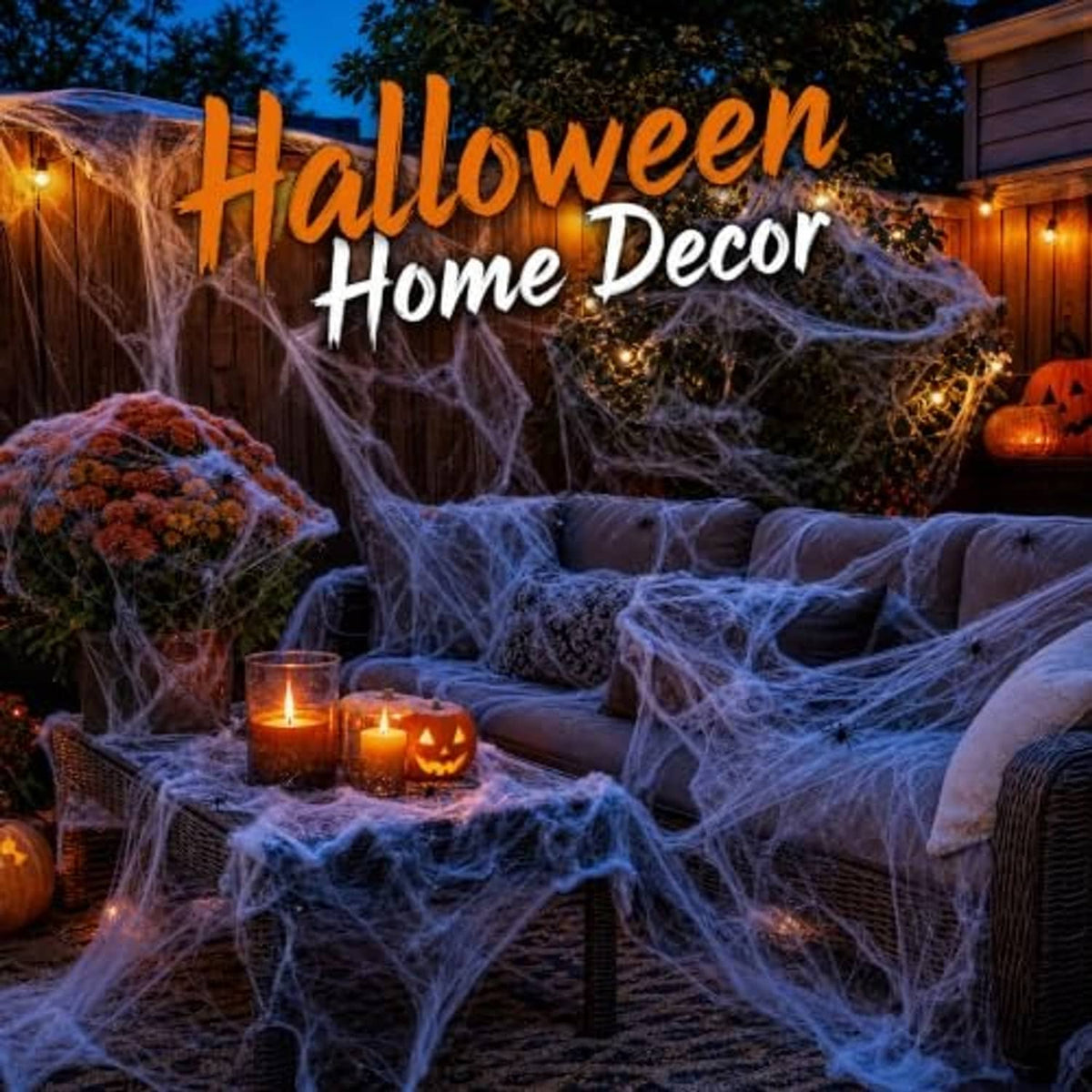 Outdoor Halloween spider webbing draped over patio seating with glowing jack-o-lanterns