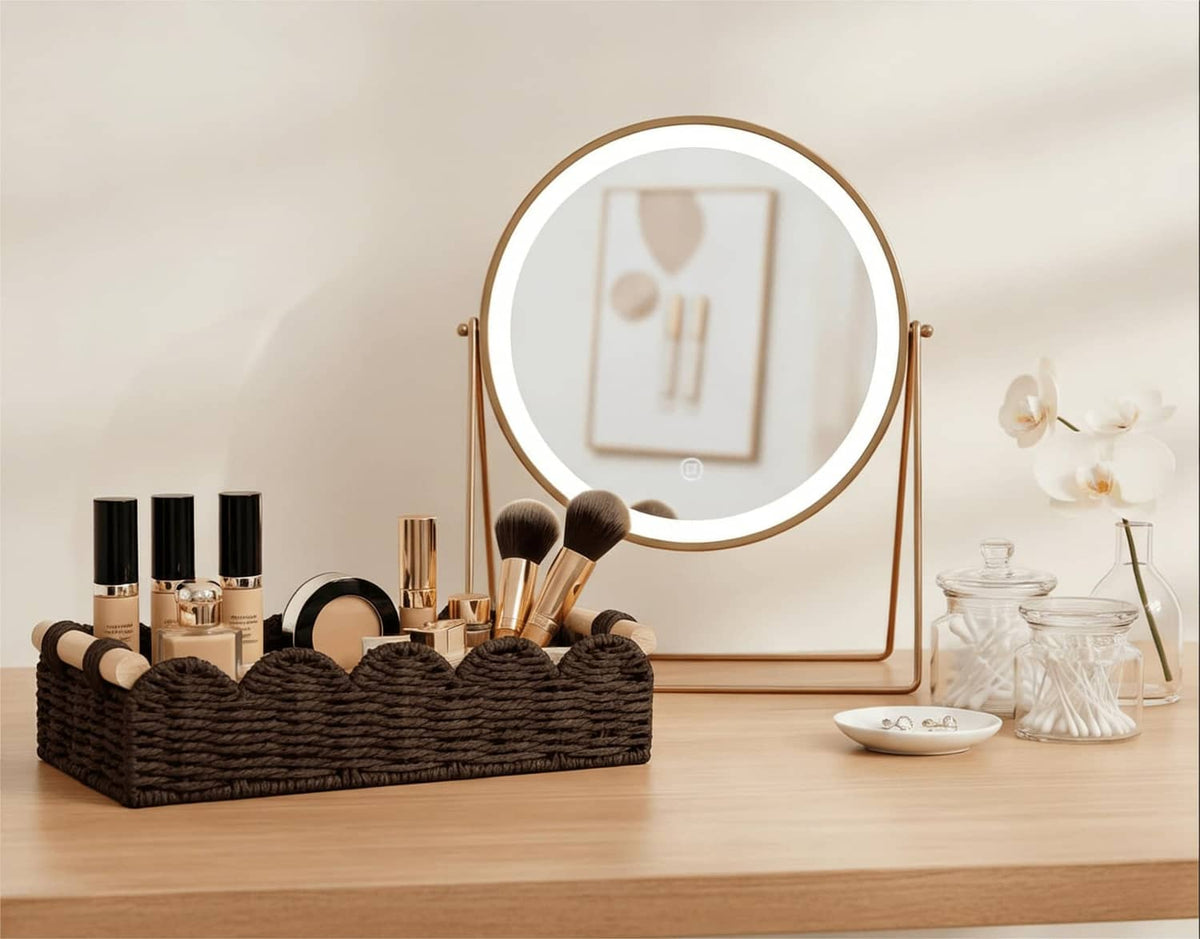 Brown woven toilet paper holder basket on vanity with makeup brushes and beige rope handles