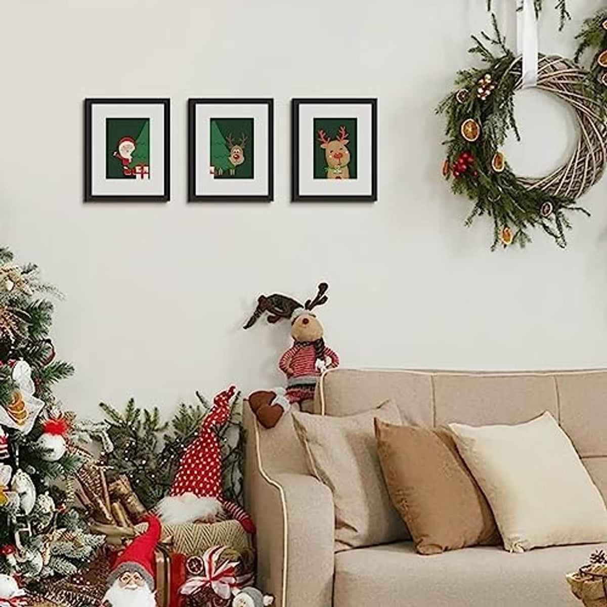 Black picture frames arranged in a row on the wall