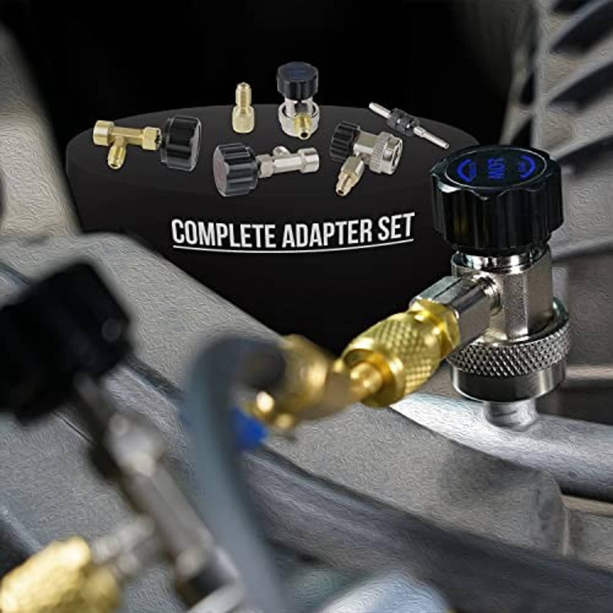 A/C manifold adapter set with chrome valve fitting, brass connections, and control knobs