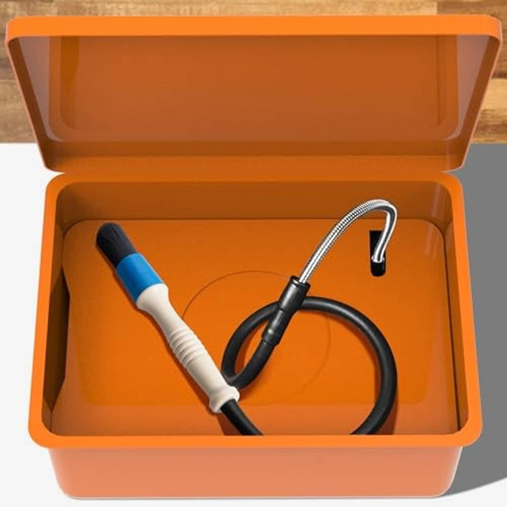 Parts washer brush and black hose set inside an orange storage case