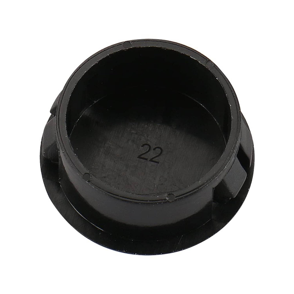 Black round plastic hole plug cover with embossed marking inside