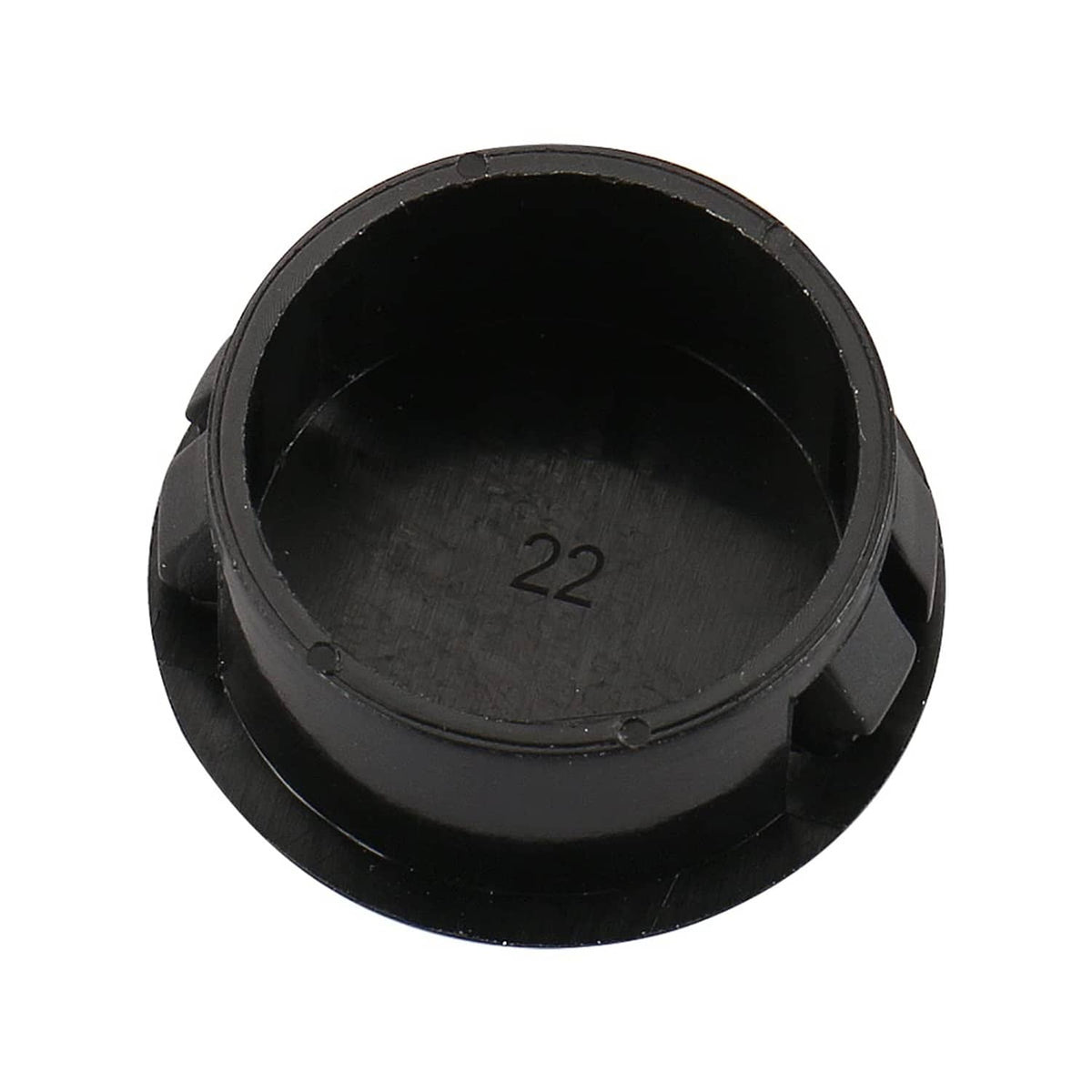 Black round plastic hole plug cover with embossed marking inside