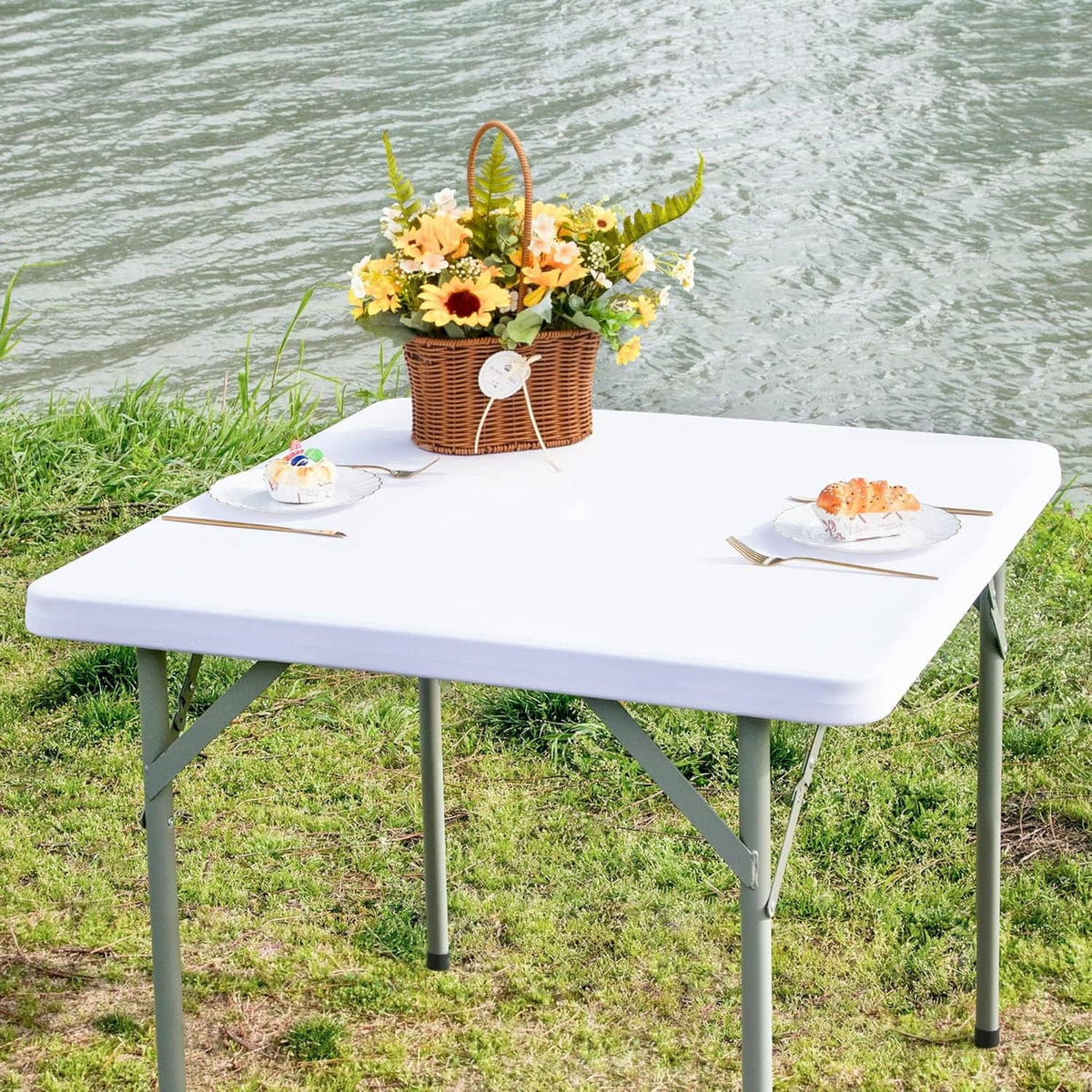 Square fitted white table cover on table top, snug elastic stretch fit