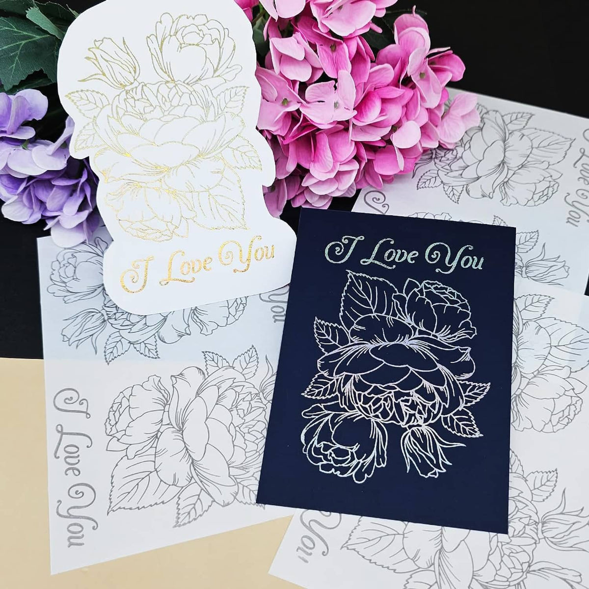 Floral “I Love You” foil transfer sticker sheets, white and dark-blue designs