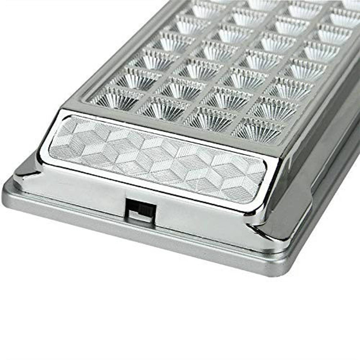 Chrome rectangular LED light close-up with textured clear lens and multiple LED cups