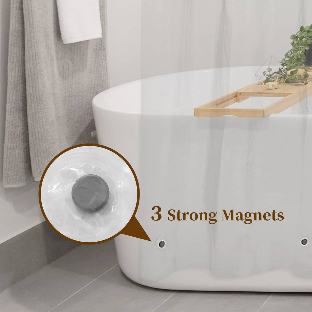 Clear shower liner with three magnets to help it cling to the tub edge.