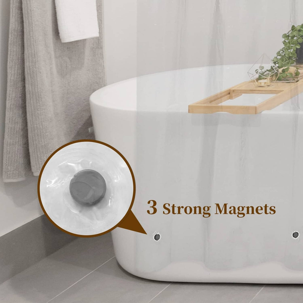 Clear shower liner with three magnets to help it cling to the tub edge.
