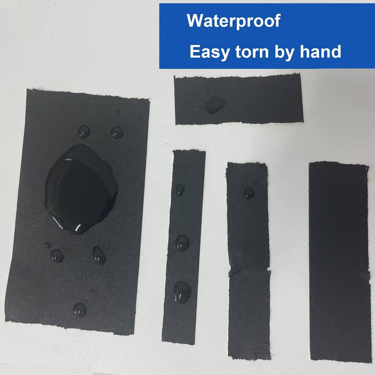 Black gaffer tape strips applied to fabric surface for temporary attachment