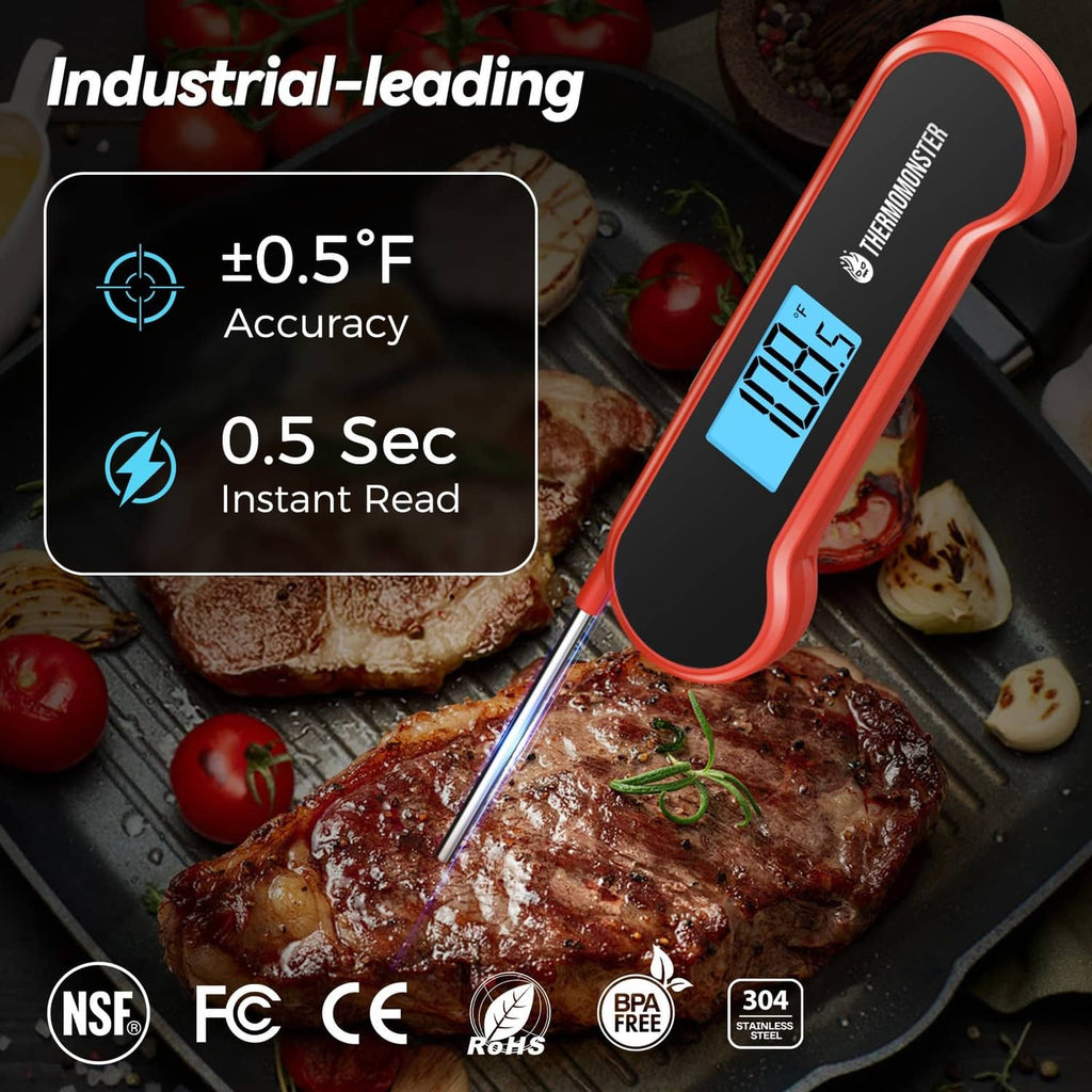 Red instant-read meat thermometer with blue LCD, next to cooked steak