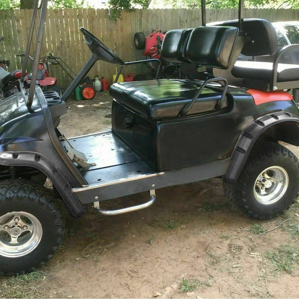 Golf cart with installed dark gray/black fender flares on front and rear wheel areas