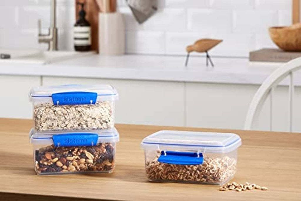 Rectangular food storage containers with blue snap lids for pantry dry goods