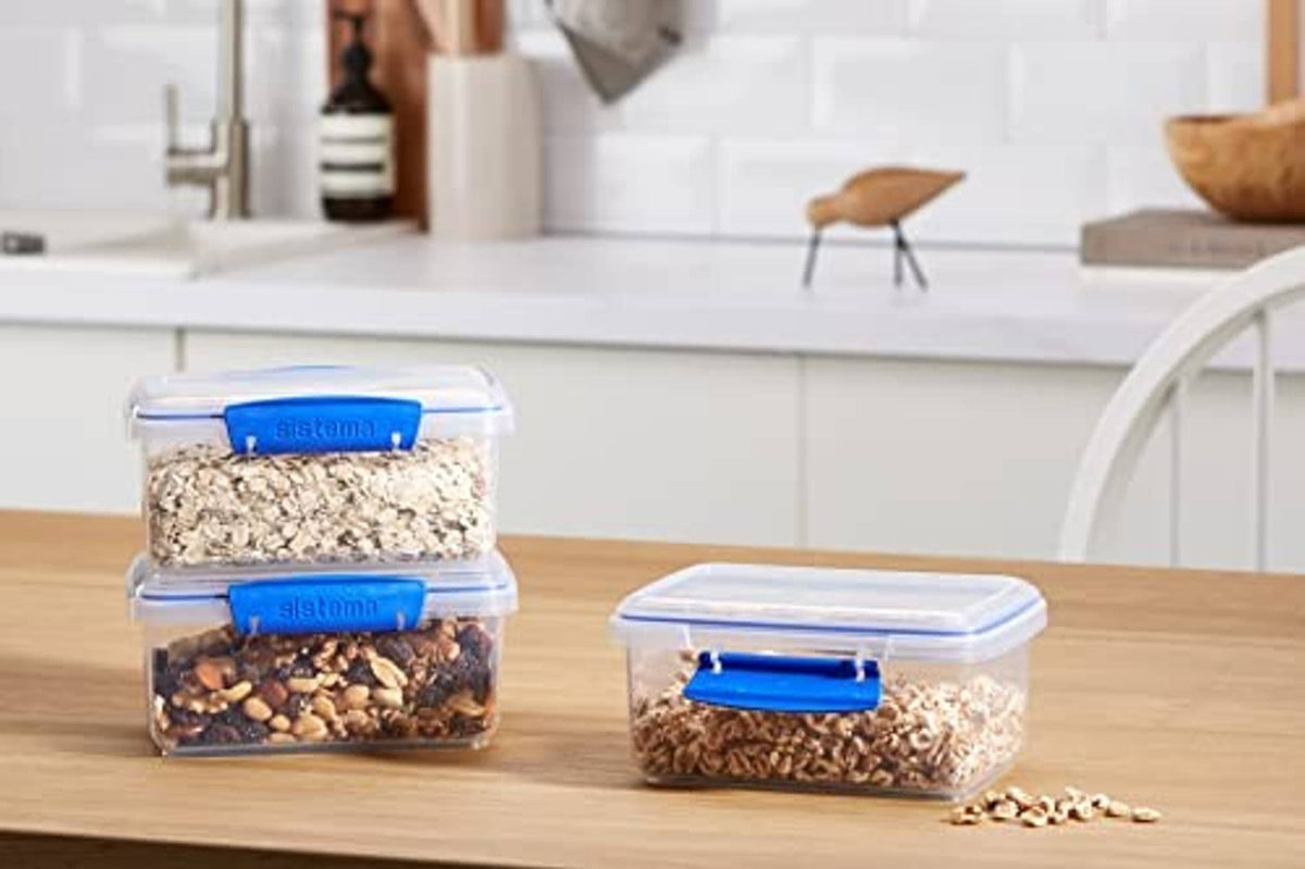 Rectangular food storage containers with blue snap lids for pantry dry goods