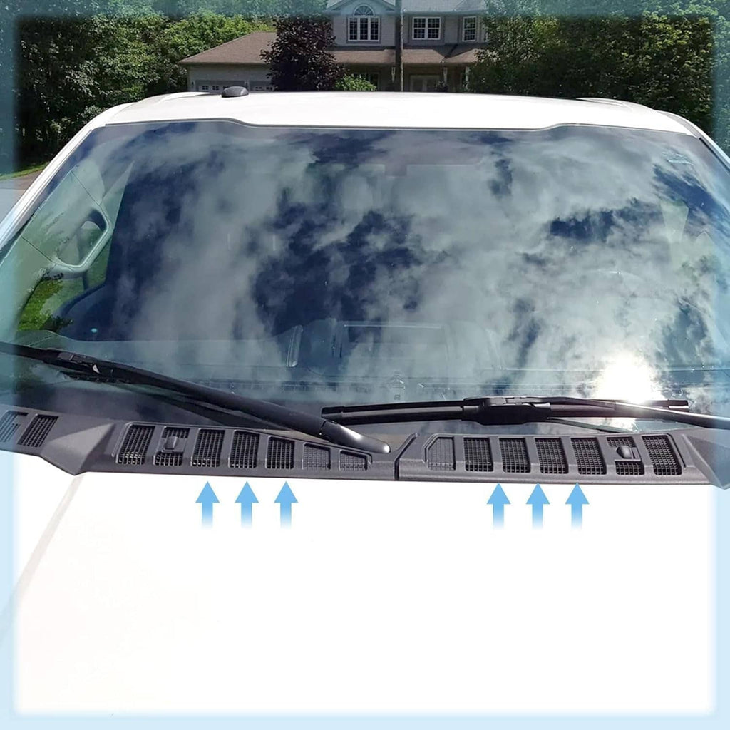 Black vented cowl panel installed under the windshield wiper area