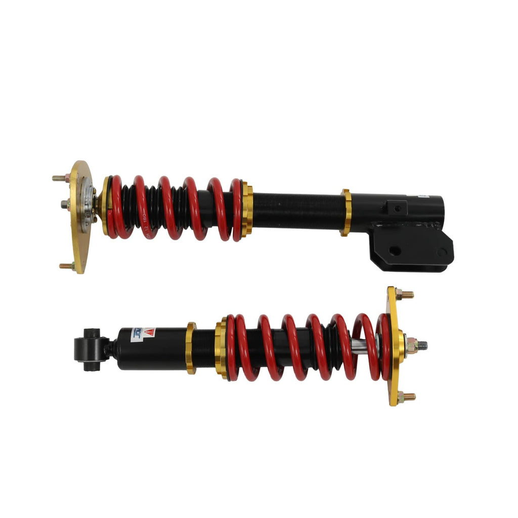 Two coilover struts side by side with red springs, black shocks, gold spring hats