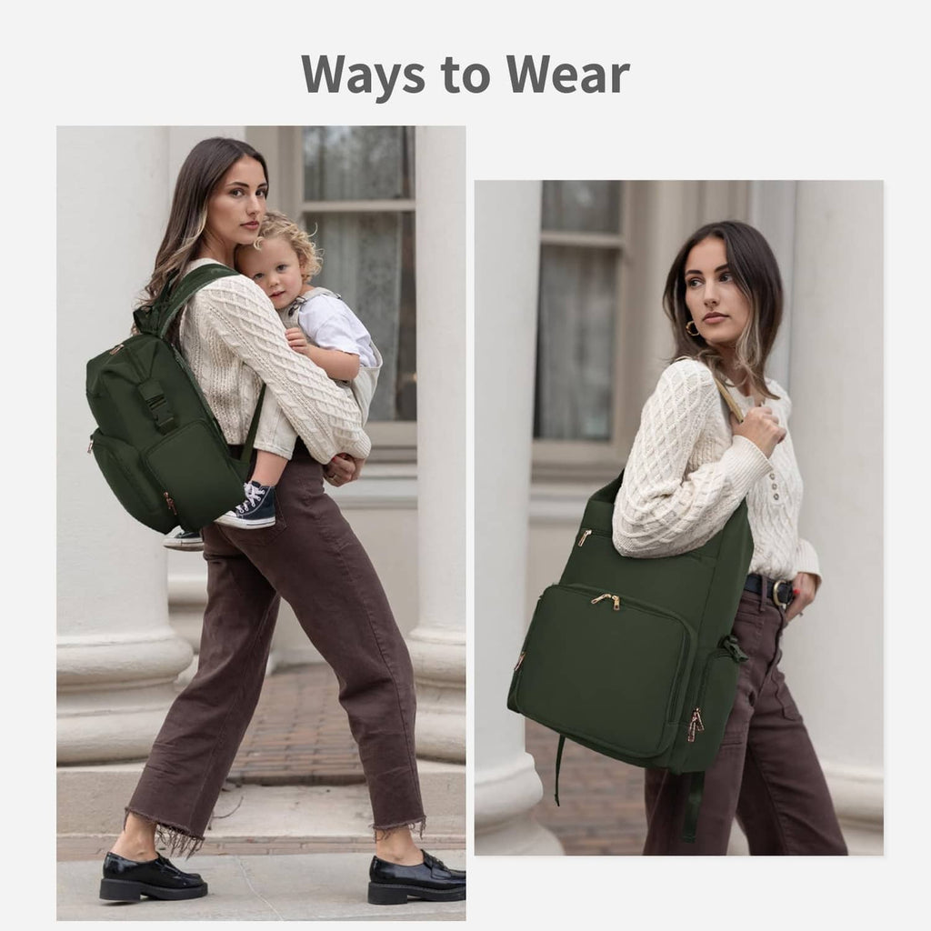 Green diaper bag backpack worn on both shoulders with zip front pocket and top handle.
