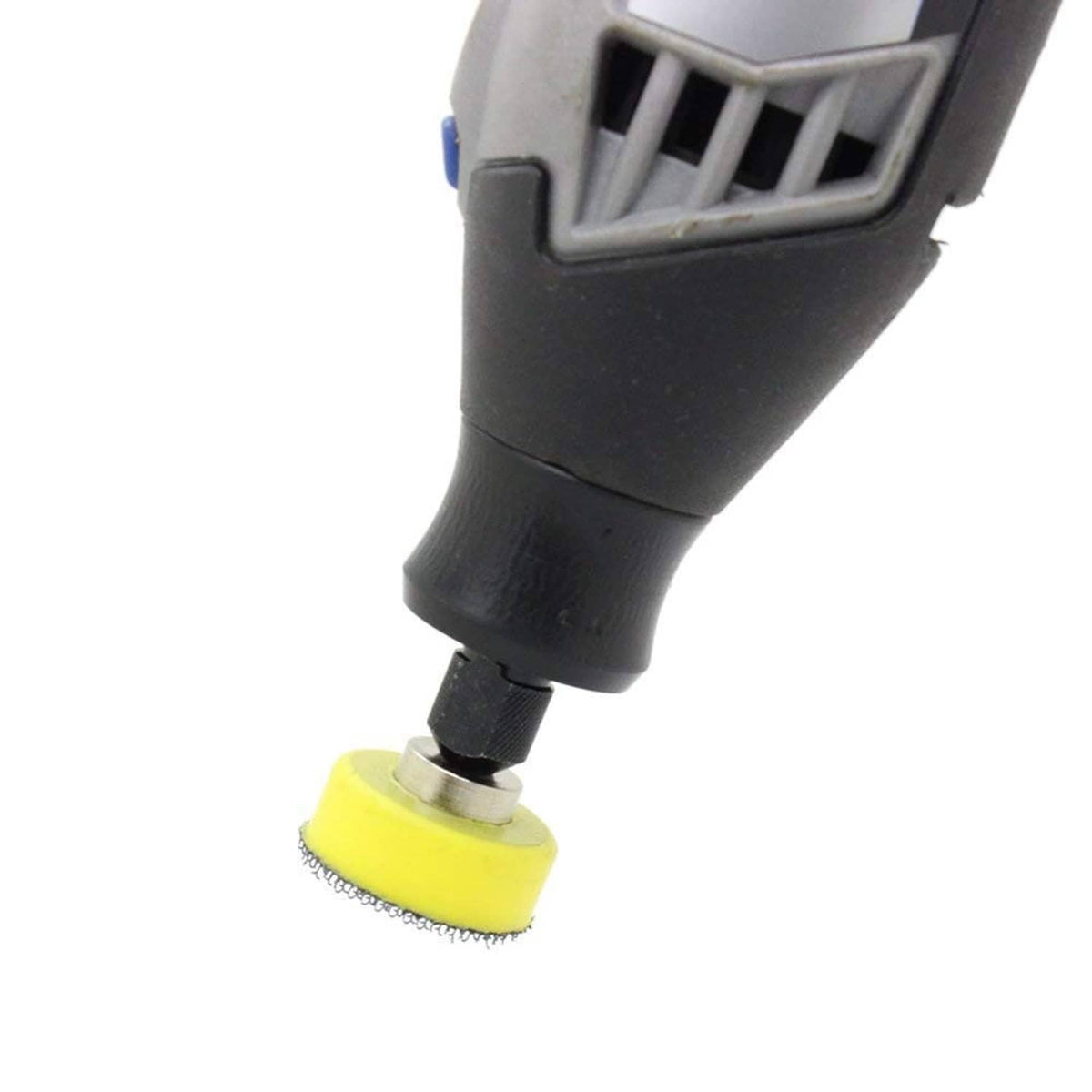 1-inch sanding disc on yellow pad attached to a power tool head