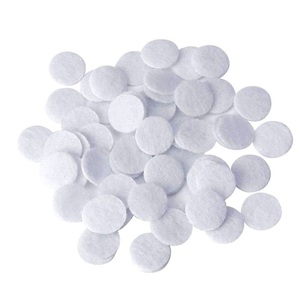 White microdermabrasion cotton filter discs, round felt pads, assorted sizes