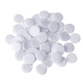 White microdermabrasion cotton filter discs, round felt pads, assorted sizes
