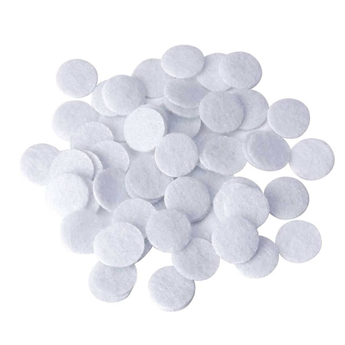 White microdermabrasion cotton filter discs, round felt pads, assorted sizes