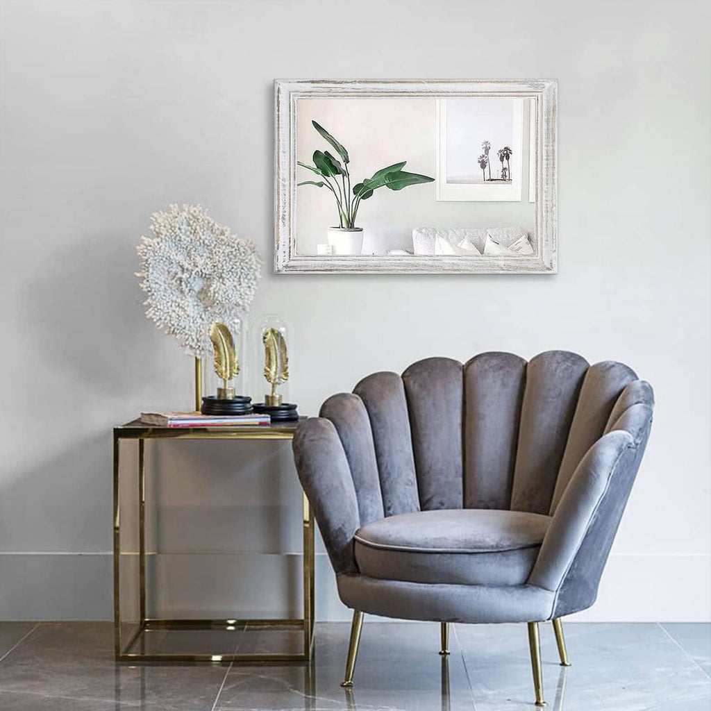 Rectangular wall mirror with distressed white wood frame and reflective glass