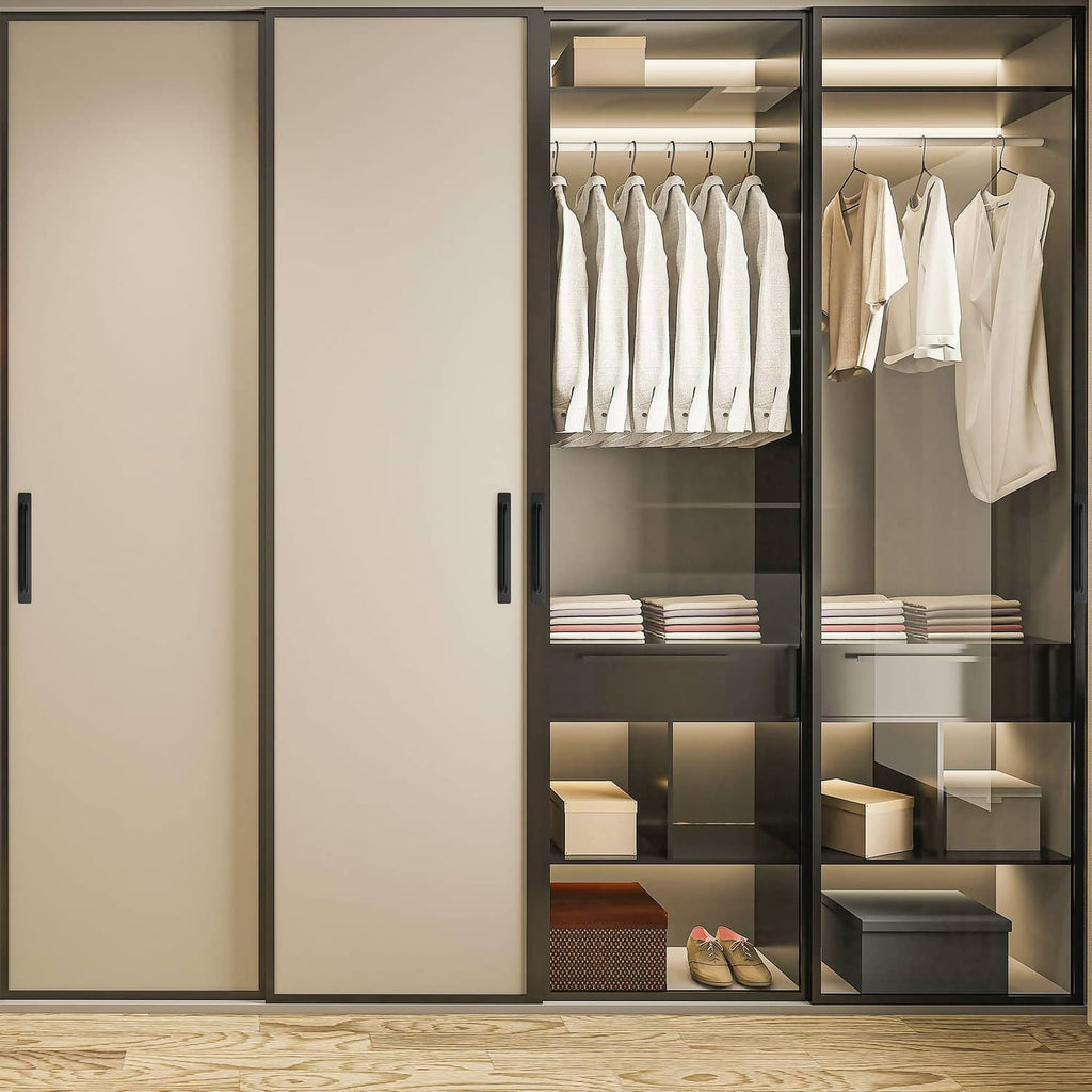 Black bar handles on open wardrobe doors for cabinets and drawers