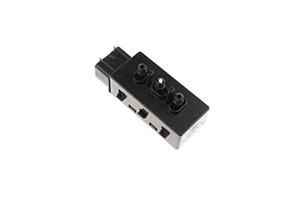 Power seat adjustment switch with angled view of multi-port connector and control knobs