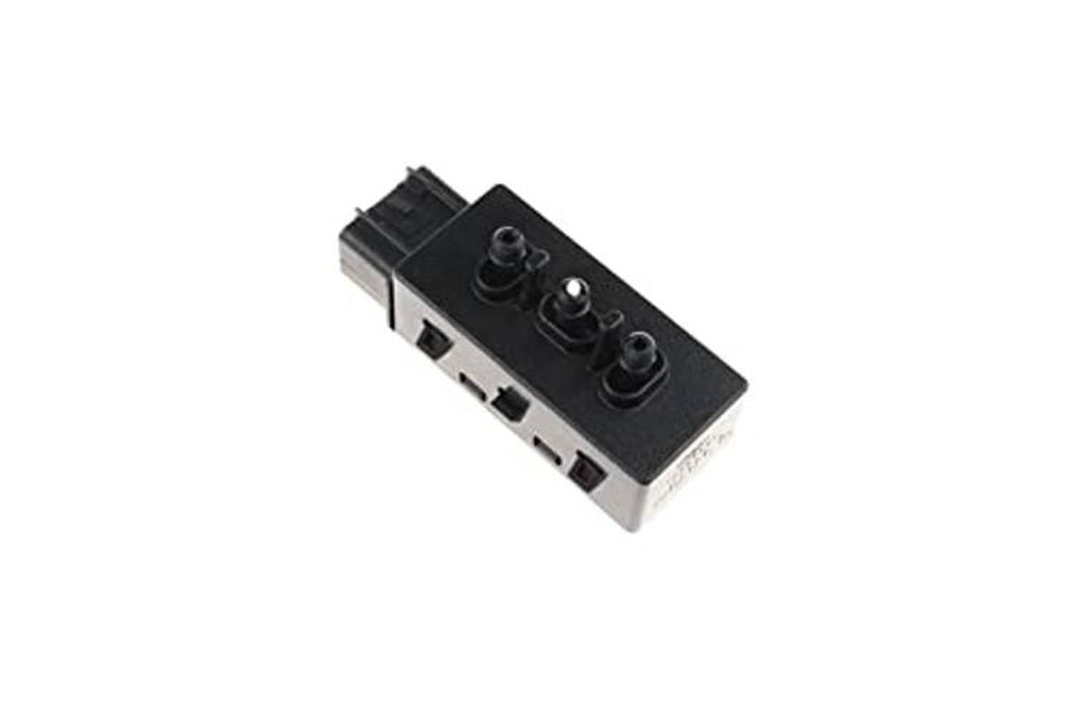 Power seat adjustment switch with angled view of multi-port connector and control knobs